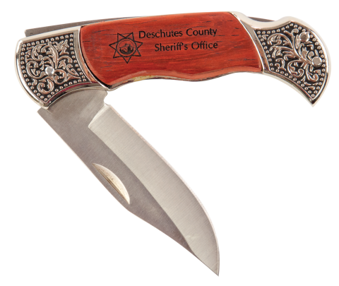 Rosewood finish handle with decorative trim.