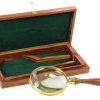 Antique reproduction hand magnifier features solid hardwood handle and solid brass ribbed trim, housed in a beautiful hardwood case.